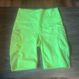 Lime green Fabletics Powerhold Biker Shorts